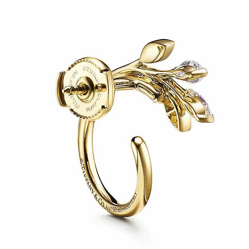 Twisted Leaf Cubic Zirconia Earrings: 24K Gold Plated Brass with AAA CZ