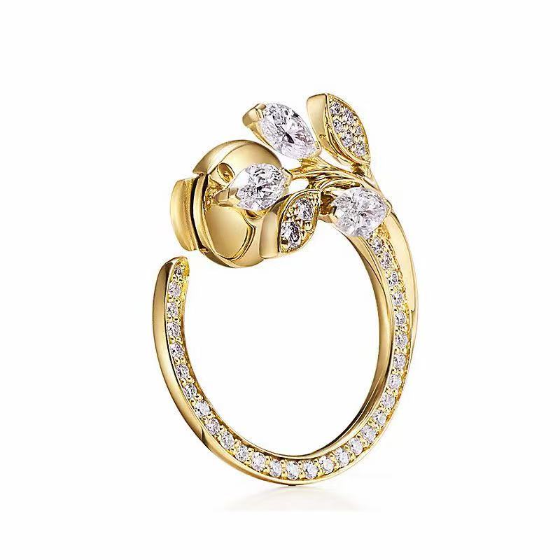 Twisted Leaf Cubic Zirconia Earrings: 24K Gold Plated Brass with AAA CZ