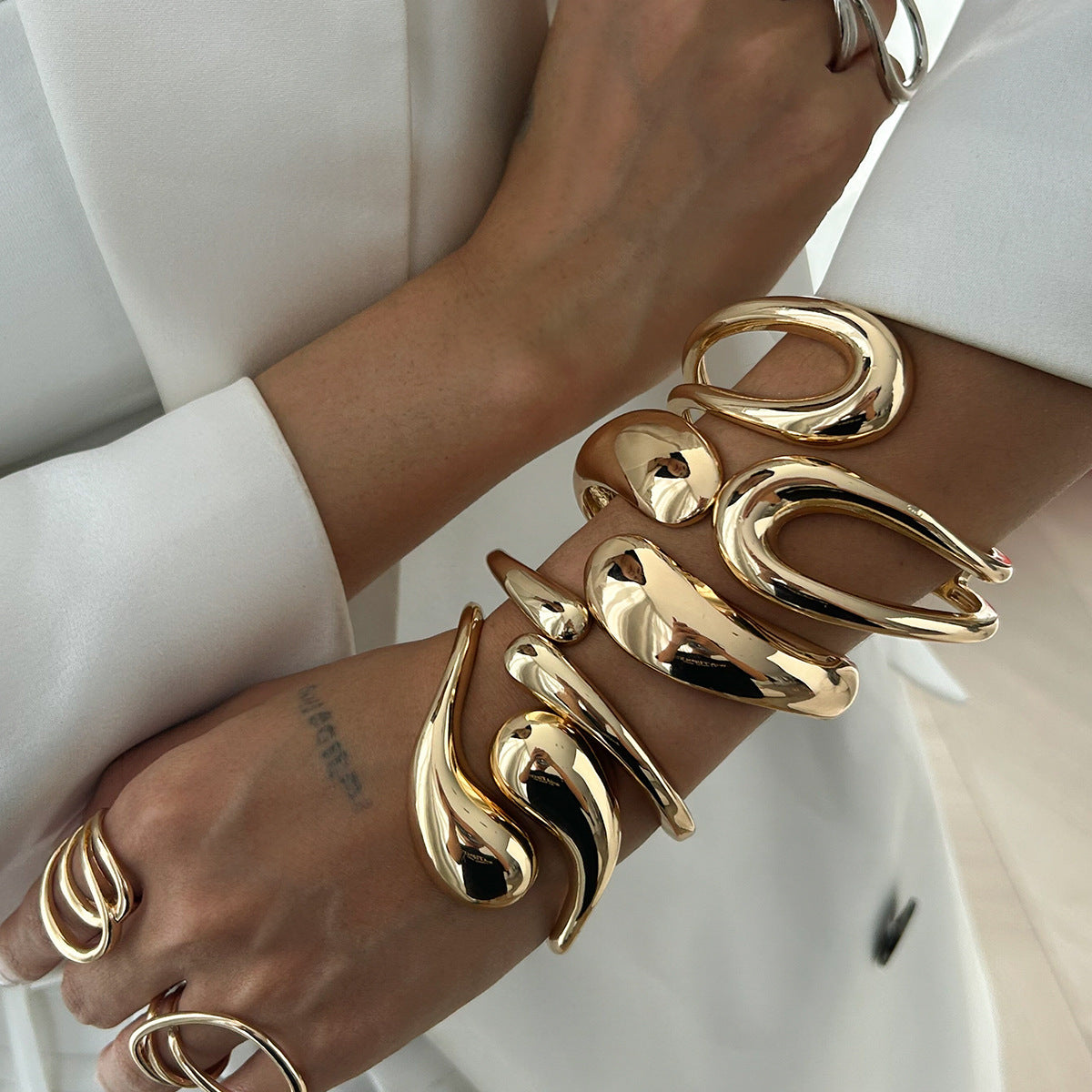 Futuristic Smooth Geometric Bracelet with Droplet Texture